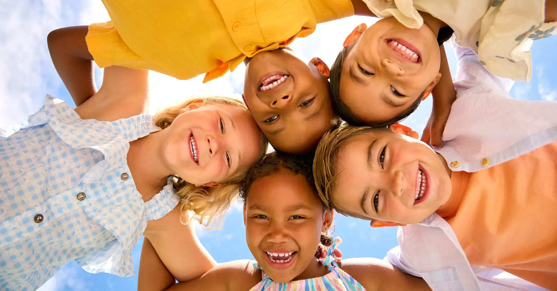 Children huddling in a circle