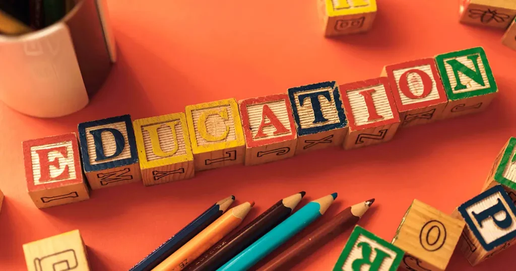 Happy Days Philosophy with blocks spelling out Education